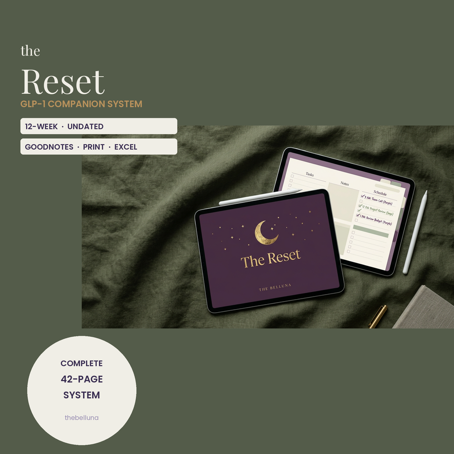 The Belluna Reset cover on two tablets over olive linen, gold moon logo